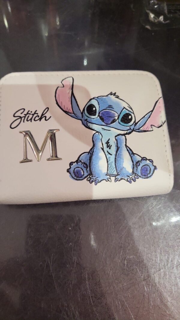 Stitch coins bag letter M